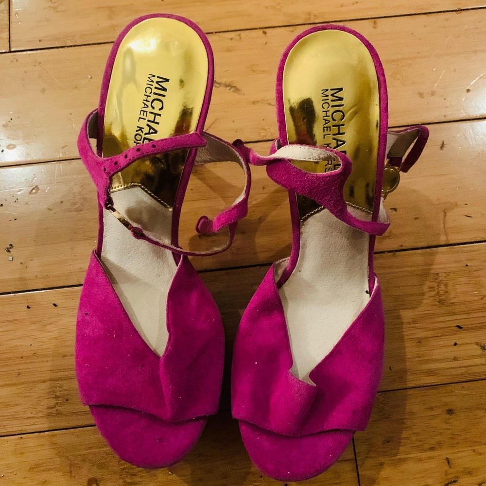 Fuschia pink Michael Kors sandals.